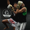 Two boxers in a sparring pose with 'Legacy' branding in the background