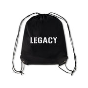 Official Team Legacy BJJ Gi in black, featuring a 450 GSM Pearl Weave Plus jacket, 10 oz cotton drill pants, reinforced stitching, and includes a white belt and drawstring bag.