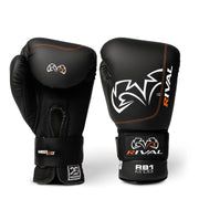 Black boxing gloves with Rival branding on a white background