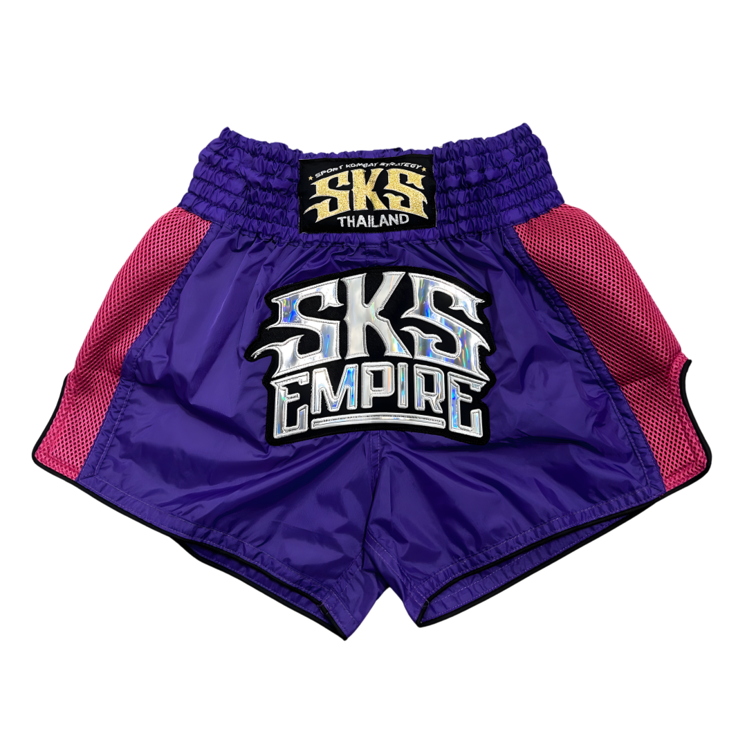 Purple and red shorts with 'SKS Empire' branding on a white background