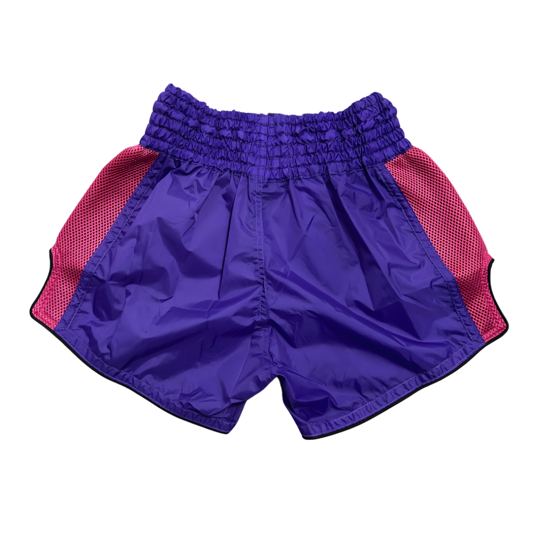Purple shorts with red sides on a white background
