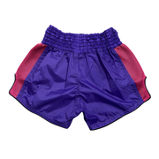 Purple shorts with red sides on a white background