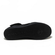 Black sandal with a strap on a white background