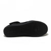 Black sandal with a strap on a white background
