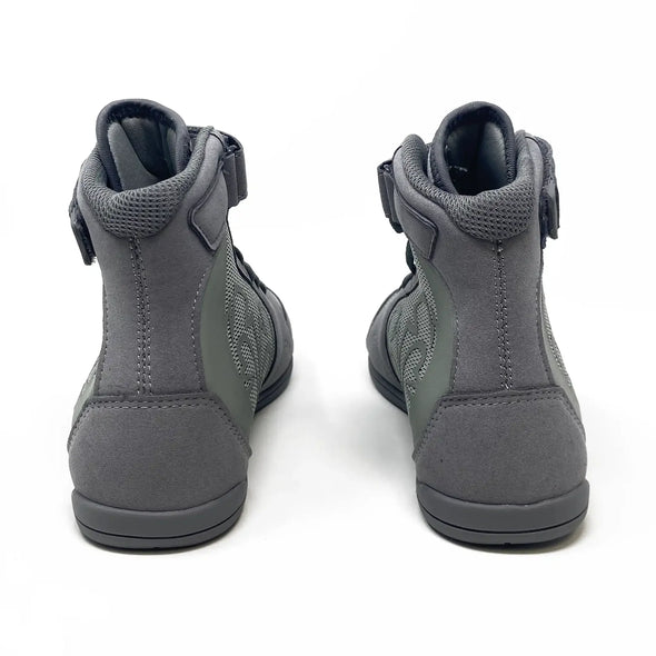 Pair of gray high-top shoes on a white background