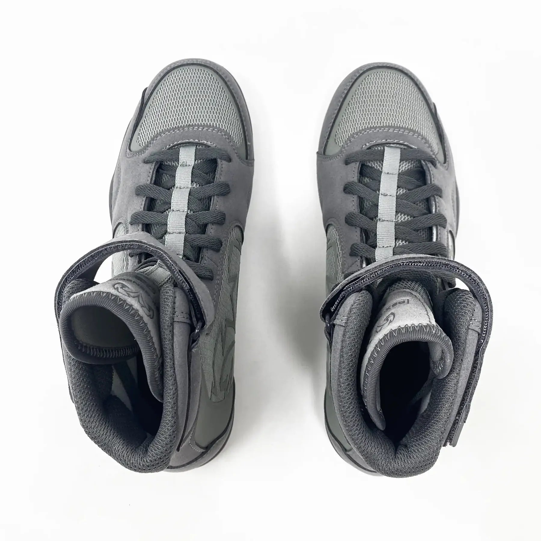 Pair of gray high-top sneakers on a white background