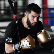 Rival rs11v evolution sparring gloves – high-performance boxing gloves featuring extra-thick layered foam padding, v-strap wrist lock system, and 15-degree angle cuff for enhanced protection and support during intense sparring sessions