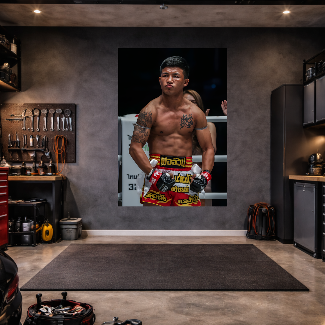 Garage interior with a large poster of a boxer on the wall.
