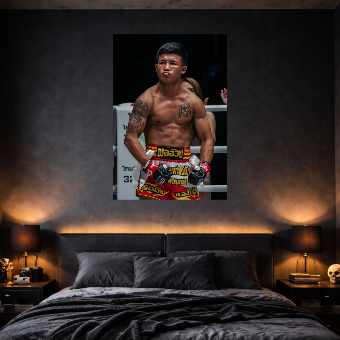 Bedroom with a framed picture of a boxer on the wall above the bed.