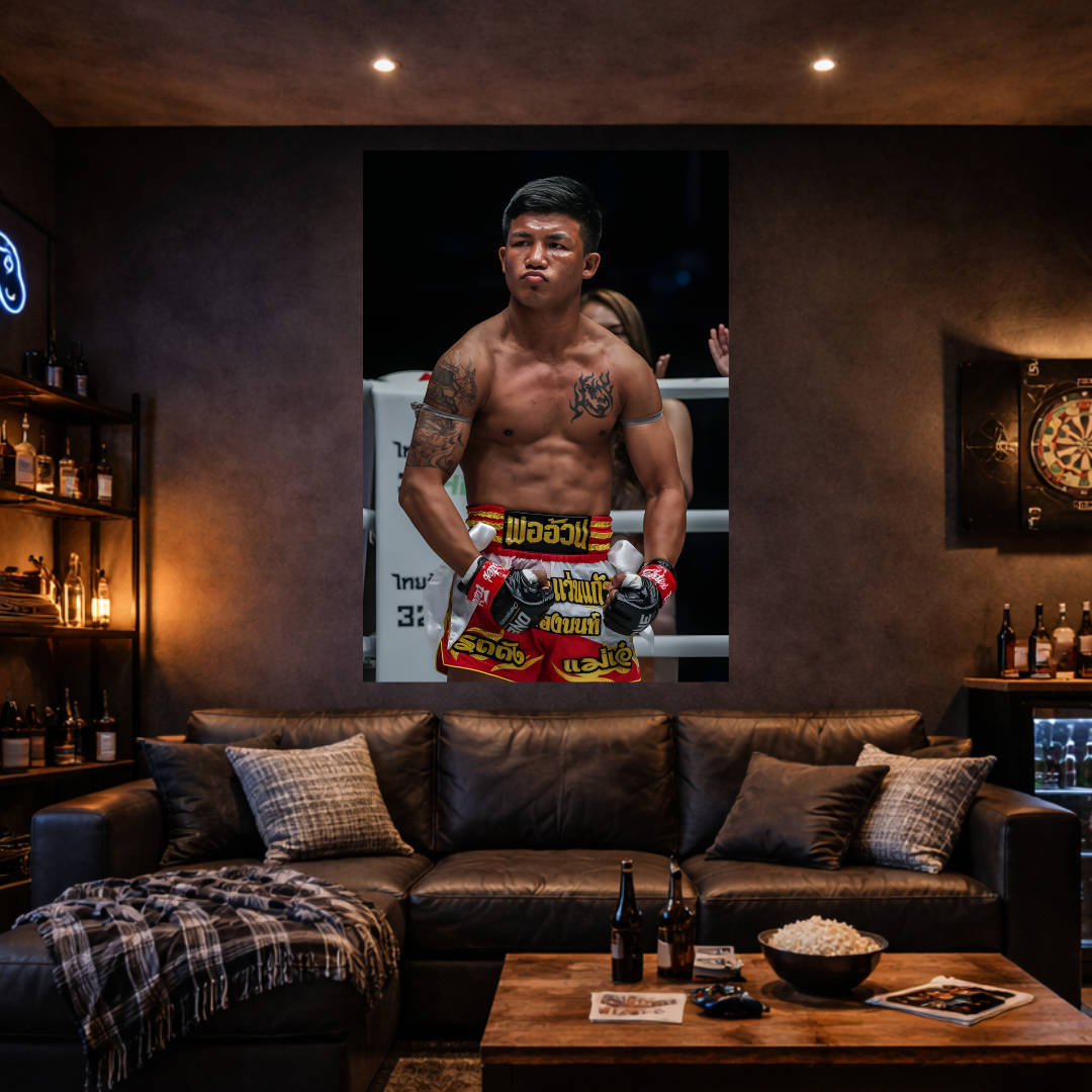 Man in boxing gear on a screen in a dimly lit room with a couch and drinks.