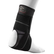 Shock Doctor ankle sleeve with adjustable compression wrap providing moderate support for ankle injuries