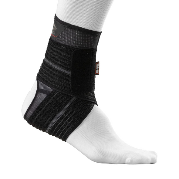 Shock Doctor ankle sleeve with adjustable compression wrap providing moderate support for ankle injuries