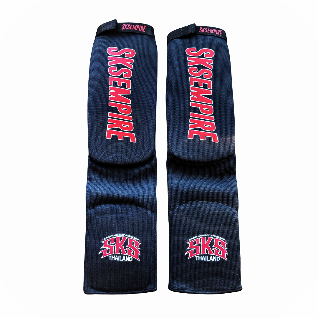Two black ski sleeves with red 'SKS Empire' branding on a white background