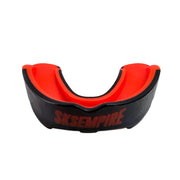Black and red mouthguard with 'SKSEMPIRE' branding on a gray background