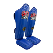 Blue shin guards with 'SKS Empire' branding on a white background