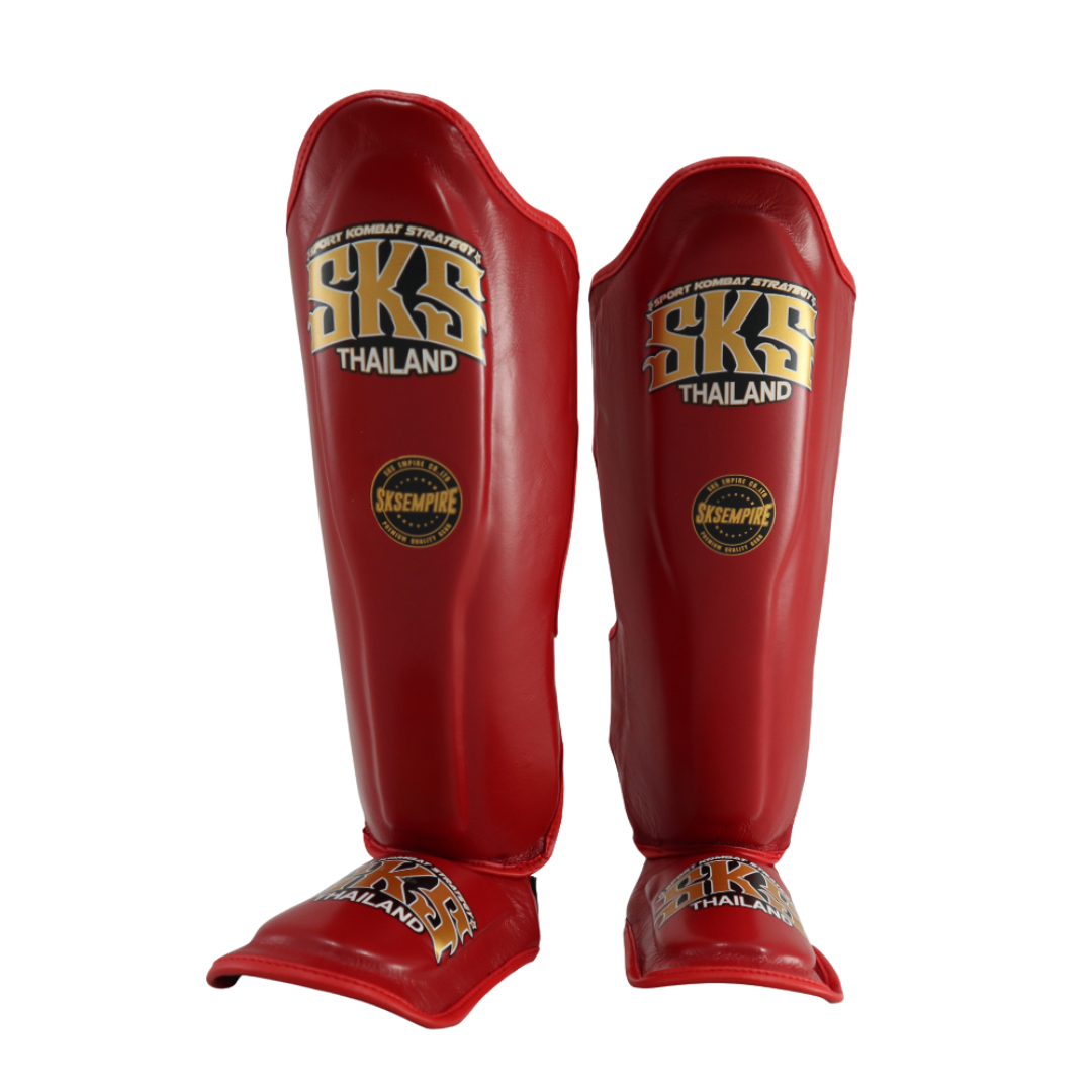 Red shin guards with SKS Thailand branding on a white background