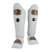 White shin guards with SKS Thailand branding on a white background