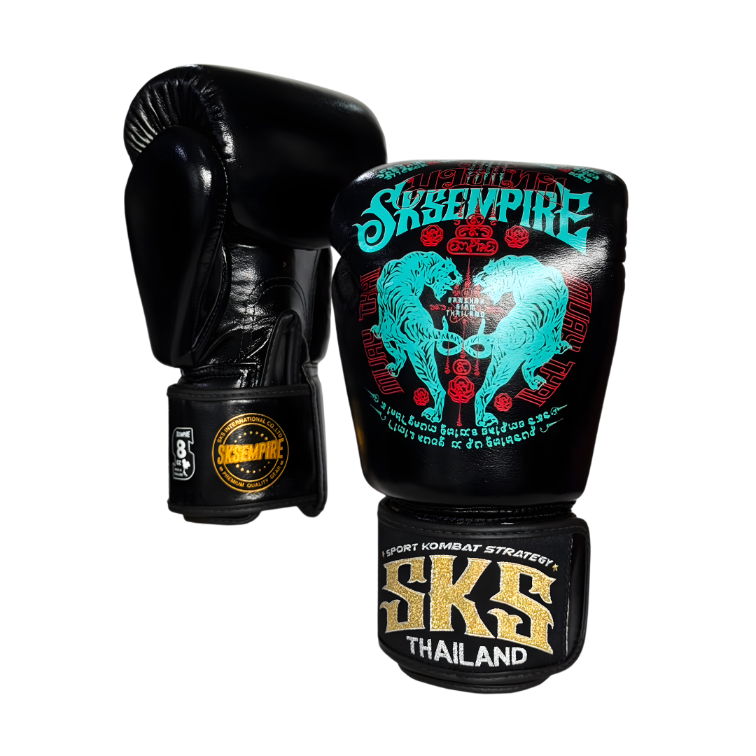 Black boxing gloves with blue and gold design on a white background