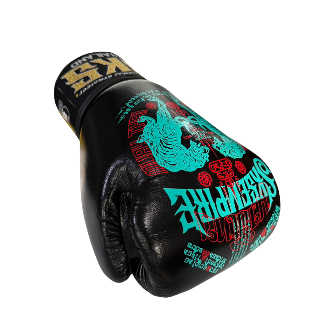 Black boxing glove with colorful designs and branding on a white background