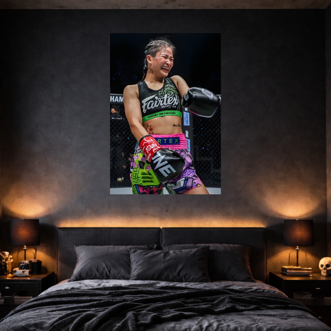 Bedroom with a boxing-themed poster of a female fighter on the wall.