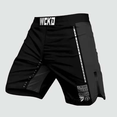 Black athletic shorts with WCKD branding on a white background