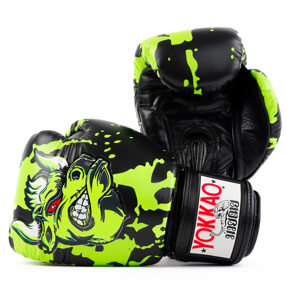 Black and green boxing gloves with a dragon design on a white background