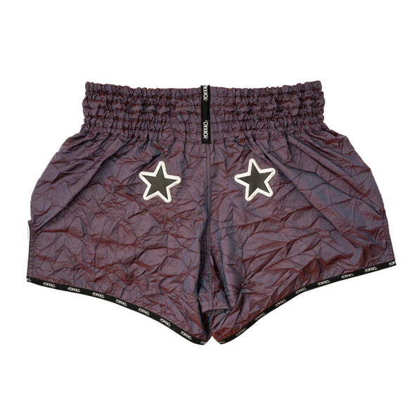 Pair of shorts with star designs on a white background