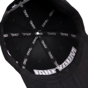 Black cap with white text on a white background
