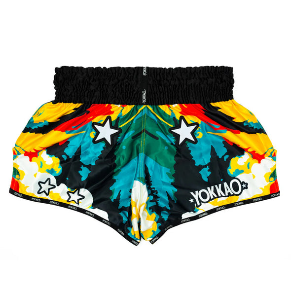 Colorful athletic shorts with star patterns and YOKKAO branding on a white background