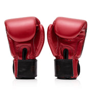 Fairtex Golden Jubilee Limited Edition Boxing Gloves with gold finish and nylon bag, premium microfiber gloves for Muay Thai, kickboxing, and boxing