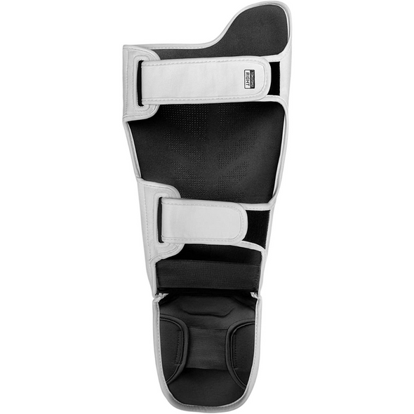 Hayabusa T3 Striking Shin Guards for Muay Thai and MMA training with durable Vylar leather and non-slip silicone lining