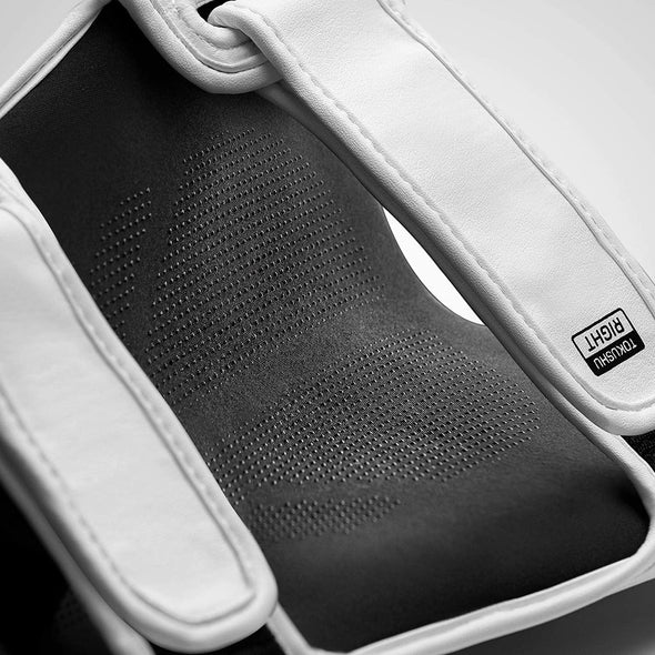 Hayabusa T3 Striking Shin Guards for Muay Thai and MMA training with durable Vylar leather and non-slip silicone lining