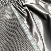 Shadow Frank Muay Thai shorts by Legacy with lightweight satin and embroidered design for Thai boxing