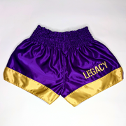 Legacy Twin Tigers Muay Thai shorts with custom embroidery and traditional Thai boxing design